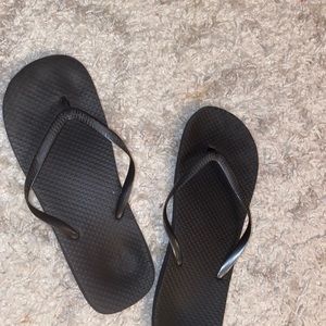 Rubber worn flip flops